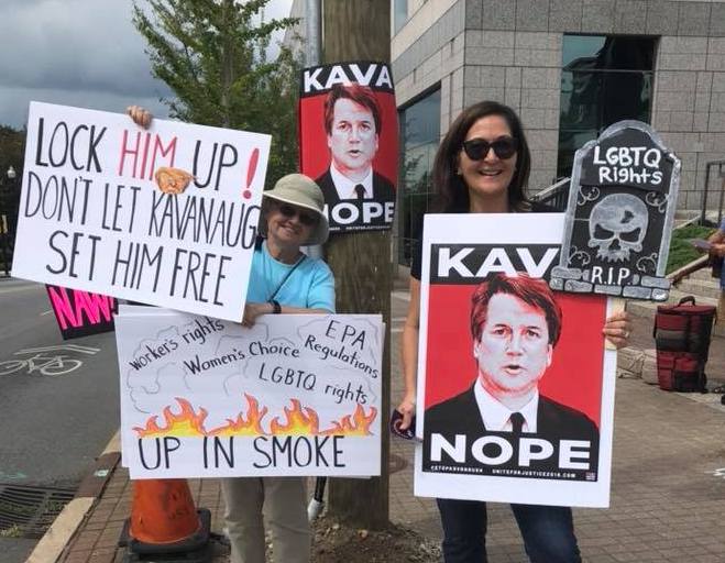 protesters with signs